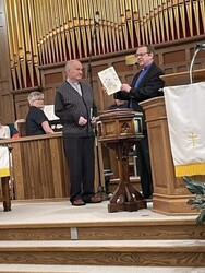 Receiving card from the congregation